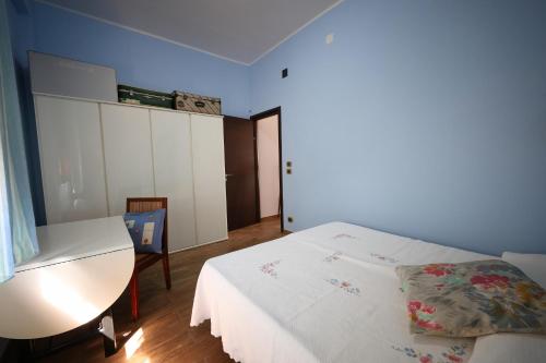Ένα ή περισσότερα κρεβάτια σε δωμάτιο στο casa filomena