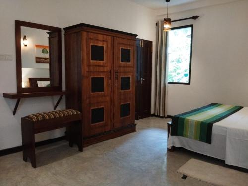 Ένα ή περισσότερα κρεβάτια σε δωμάτιο στο Sinali Villa