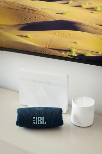 a cup and a measuring tape next to a painting at Amazing cozy Villa Hugo Tauro with Jacuzzi, Pool, Wi-Fi in Mogán