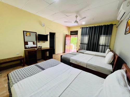 מיטה או מיטות בחדר ב-CrossCountry Inn by Thurings
