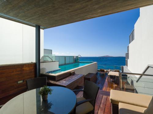 a view from the balcony of a house at Penthouse with Private Swimming Pool in Melenara