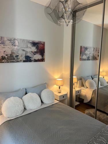 Ένα ή περισσότερα κρεβάτια σε δωμάτιο στο V71A Kauno Centre