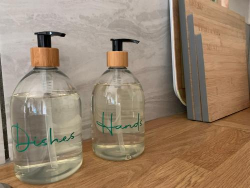 two bottles of water sitting on top of a table at Hidden gem in heart of Breckland in Watton
