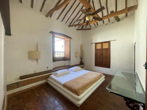 เตียงในห้องที่ Casa Real Amanvari