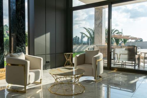 Posezení v ubytování Villa Elysium Park & SPA