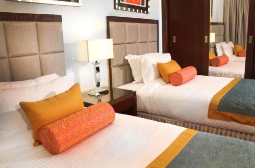 Postel nebo postele na pokoji v ubytování Tolip Hotel Alexandria