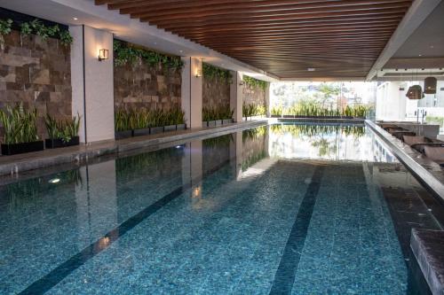 Πισίνα στο ή κοντά στο Espacio Ideal en Santa Fe Condo de 2 Recámaras