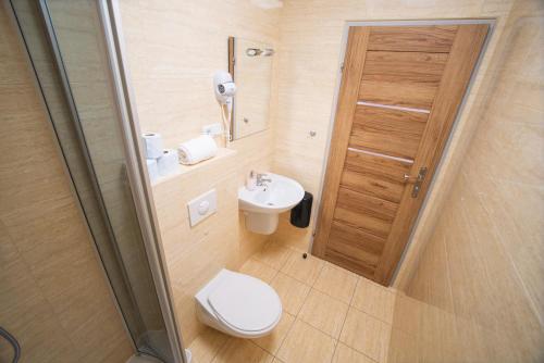 Kylpyhuone majoituspaikassa Gasthaus