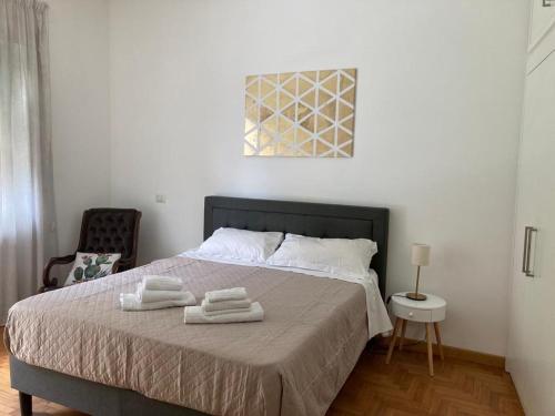 Postel nebo postele na pokoji v ubytování FAIROME Apartment 2 Pini