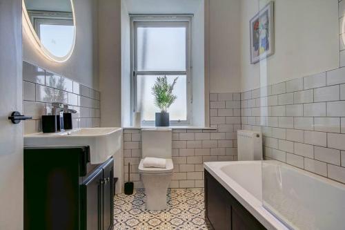 Ванная комната в The Irvine - Coorie Doon Apartments