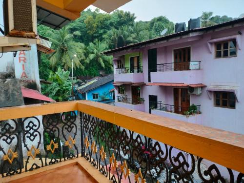 a balcony with a view of a building at Villa Cleto Guest House in Panaji