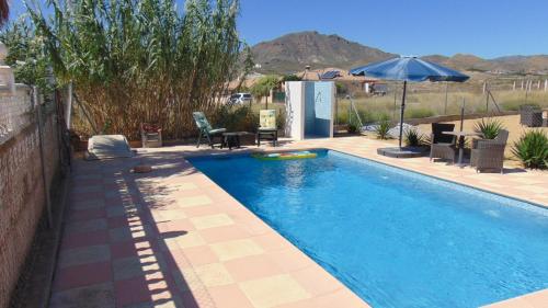 Bazén v ubytování Casa La Vida Feliz nebo v jeho okolí