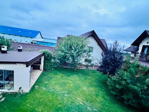an aerial view of the backyard of a house at Altheda Living Tiny House in Suceava