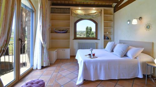 Un ou plusieurs lits dans un hébergement de l'établissement VILLA BIDDIZZA