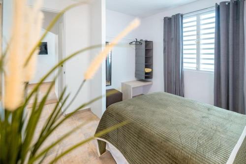 A bed or beds in a room at 3 Santurce 2 Bedroom 1Bathroom Apt