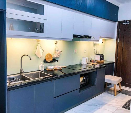 a kitchen with a sink and a counter top at Lakeview apartment - 5 minutes to Westlake - 20' to Noi bai airport in Hanoi