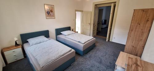 Ένα ή περισσότερα κρεβάτια σε δωμάτιο στο City center apartment Thomas No1