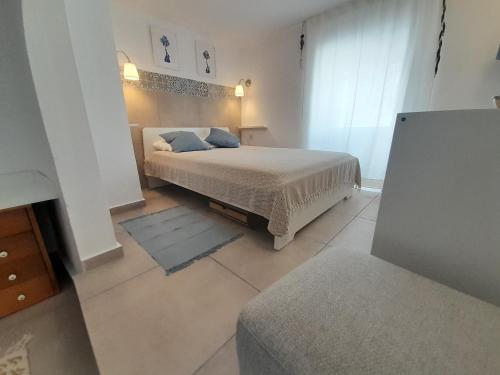 Ένα ή περισσότερα κρεβάτια σε δωμάτιο στο LILIUM HOUSE PALEKASTRO