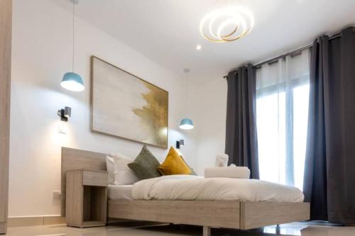 Ένα ή περισσότερα κρεβάτια σε δωμάτιο στο Lennox Beautiful 2 Bed