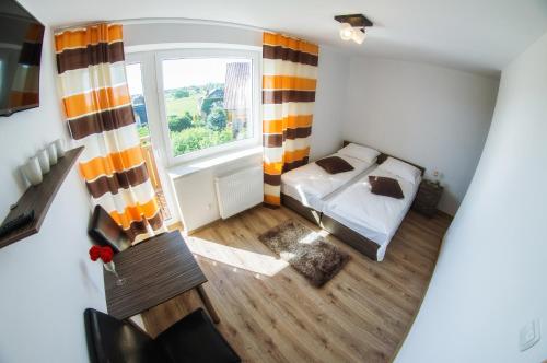 Katil atau katil-katil dalam bilik di Mazurski Zakątek-Apartamenty