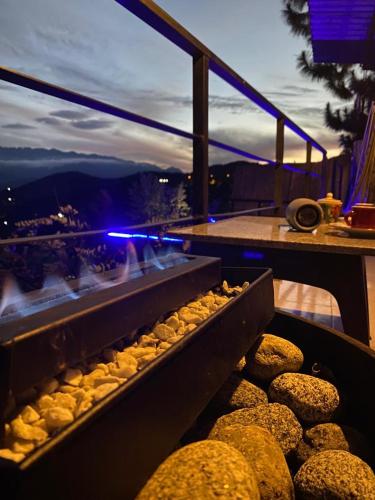 a bunch of donuts are cooking on a balcony at Romero Glamping y Cabañas in Cali