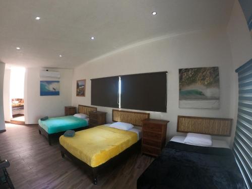 Giường trong phòng chung tại Casa La Coneja2