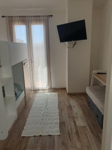 TV a/nebo společenská místnost v ubytování B&B Luchia