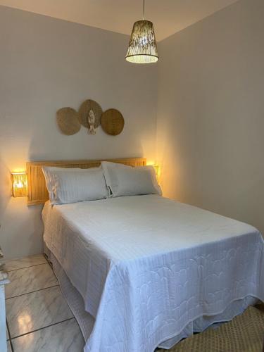Ένα ή περισσότερα κρεβάτια σε δωμάτιο στο Quintal da Casa