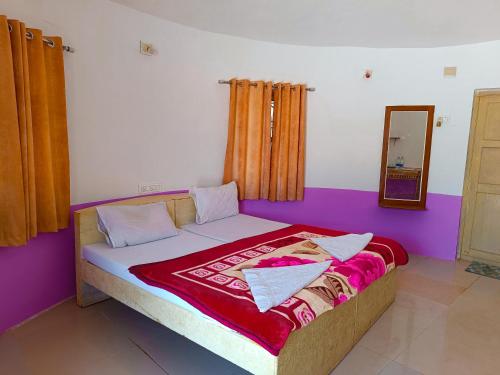 Postel nebo postele na pokoji v ubytování Hotel Rann of Kachchh