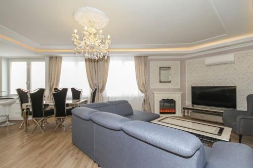 Posezení v ubytování Deluxe Apartman Nivy