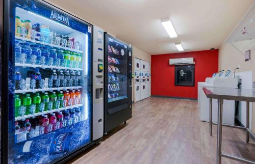 a soda machine in a store with lots of drinks at Extended Stay America Suites - Sacramento - Elk Grove in Elk Grove