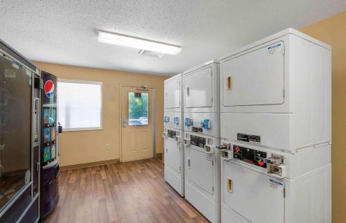 a large room with white appliances in a room at Extended Stay America Suites - Virginia Beach - Independence Blvd in Virginia Beach