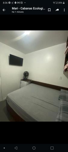 ein Bild eines Bettes in einem Zimmer in der Unterkunft Dormitórios ponto 37 in Treviso