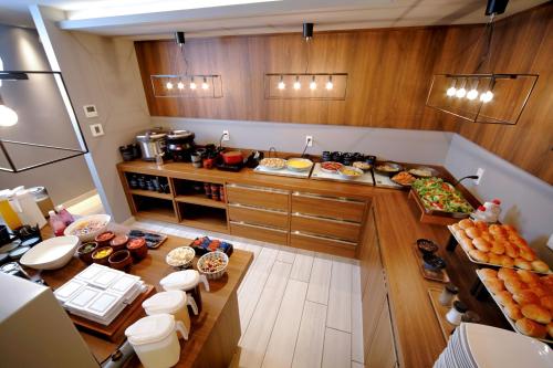 an overhead view of a kitchen with a buffet of food at Travelodge Sapporo Susukino in Sapporo