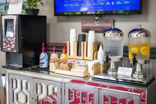 a coffee shop with a counter with a drink at Bay-Ja Vu in Sarasota
