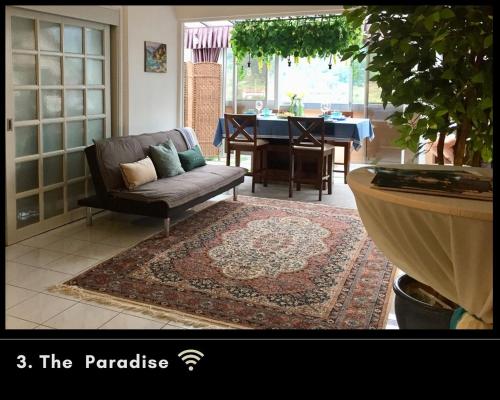 a living room with a couch and a table at ThatNicePlace in Selesa Hillhome, Bukit Tinggi, Bentong, Genting in Bentong