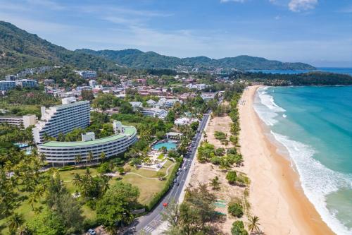 an aerial view of the beach and the ocean at Pullman Phuket Karon Beach Resort in Karon Beach