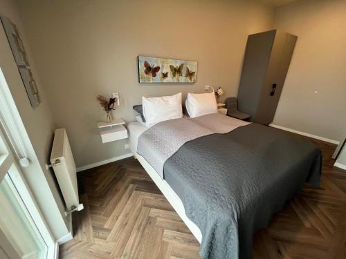 Ένα ή περισσότερα κρεβάτια σε δωμάτιο στο Iceland SJF Apartments - 301