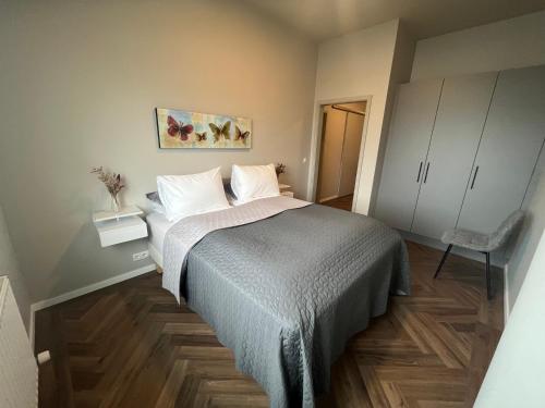 Ένα ή περισσότερα κρεβάτια σε δωμάτιο στο Iceland SJF Apartments - 301