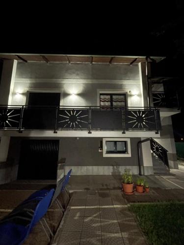 a building with a balcony on the side of it at IL Sole in Caselle Torinese