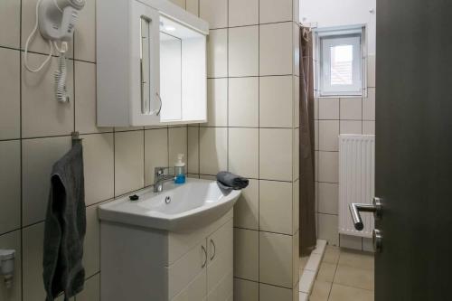 Kúpeľňa v ubytovaní SárvárLAK Apartmanház