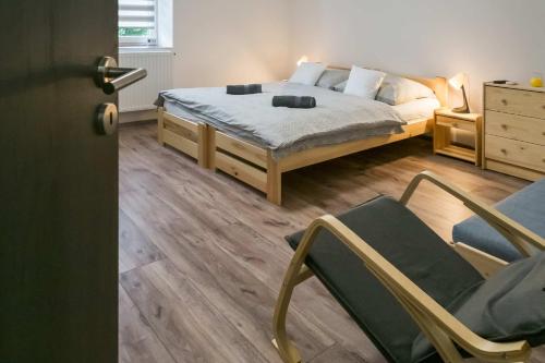 Postel nebo postele na pokoji v ubytování SárvárLAK Apartmanház
