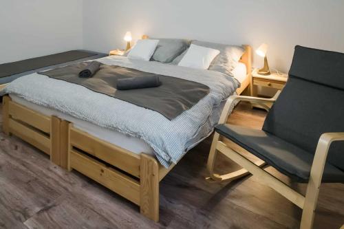 Postel nebo postele na pokoji v ubytování SárvárLAK Apartmanház