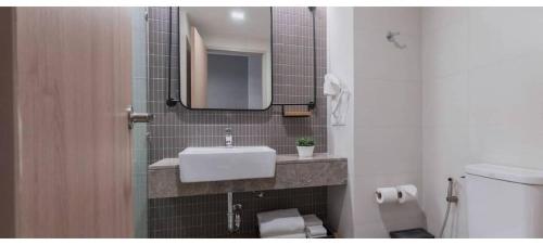 Koupelna v ubytování Bella B Hotel