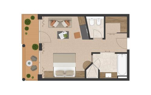 a floor plan of a room with a toilet at Naturhotel MOLIN in San Giovanni in Val Aurina