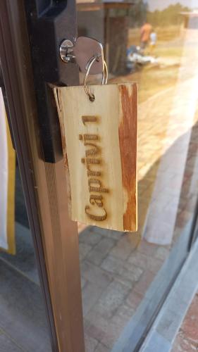 a tag on the door of a glass door at FLY FISHING PARADISE ON THE VAAL in Parys