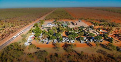 an aerial view of a camp site on the side of a road at Roebuck Plains Roadhouse in Broome