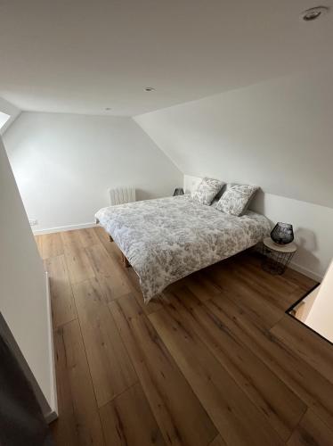 Llit o llits en una habitació de Superbe duplex plein centre