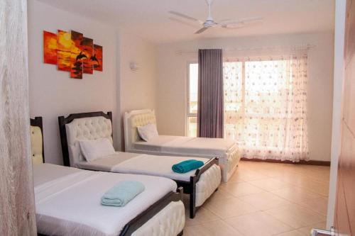 Lova arba lovos apgyvendinimo įstaigoje Lux Suites Antalya Luxury Apartments