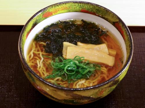 a bowl of soup with noodles and other ingredients at Onyado Nono Matsue Natural Hot Spring in Matsue